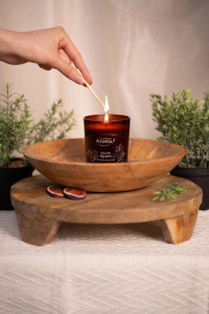 LCA-ambiance-883586-3518648835863-bougie_parfumée-sous_les_figuiers-allumette_main_flamme.jpg