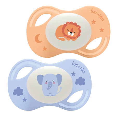 LUC ET LEA Sucettes anatomiques nuit extra-fines - +18 mois - Lion et Élephant - Lot de 2 Gamme Collection